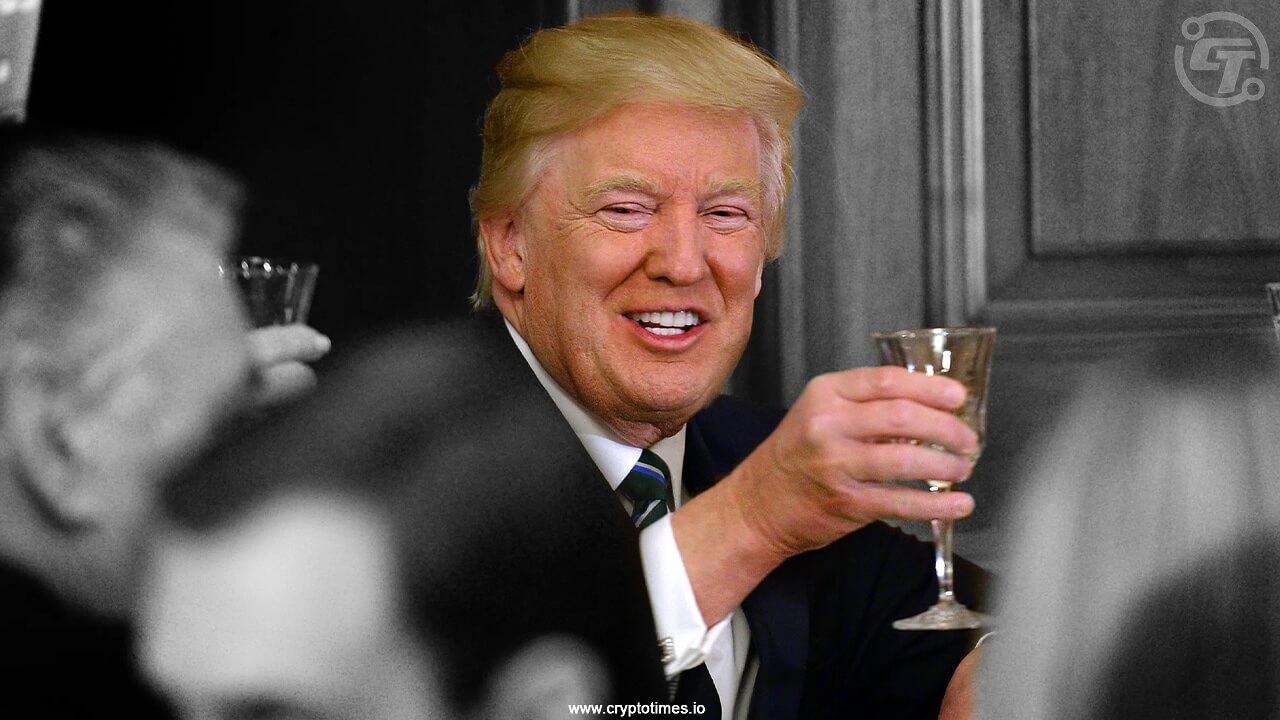 Trump toasting with a glass at a private political dinner, in a formal setting with blurred guests in the background.