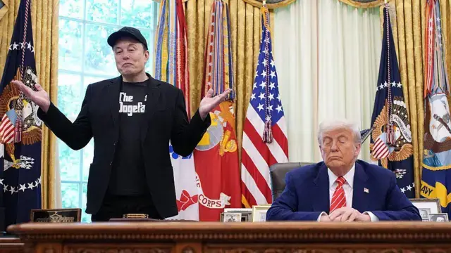 Man wearing “The Dogefather” T-shirt standing next to figure seated in the Oval Office, in front of flags and US presidential desk.